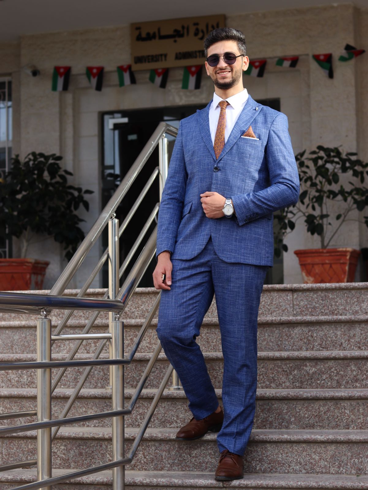 Graduation duo portrait in tailored suits